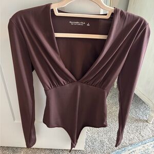 Abercrombie & Fitch Deep V-Neck Bodysuit in Rich Brown